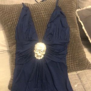SKY top in blue with rhinestone skull detail.